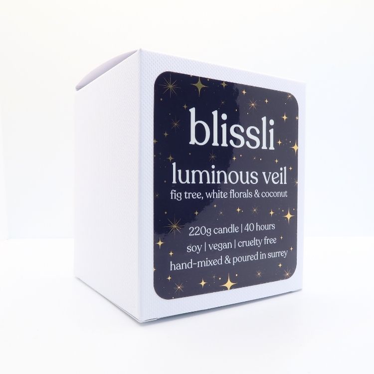 luminous veil soy candle gift box - side view showing ingredients and candle care details