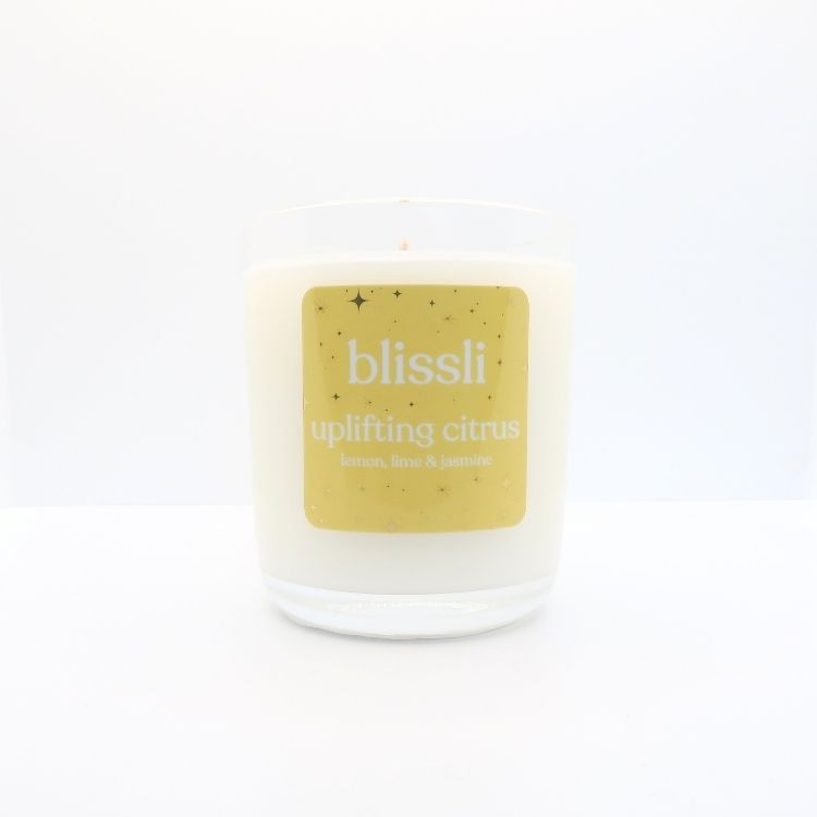 uplifting citrus 220g natural soy wax candle in clear glass jar by blissli